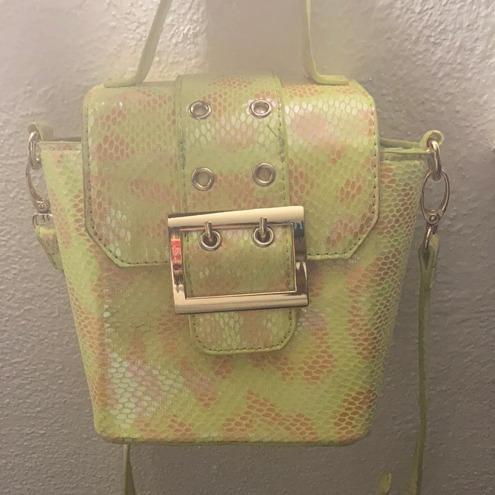 NEON purse , has a detachable strap , can become a crossbody n a handbag